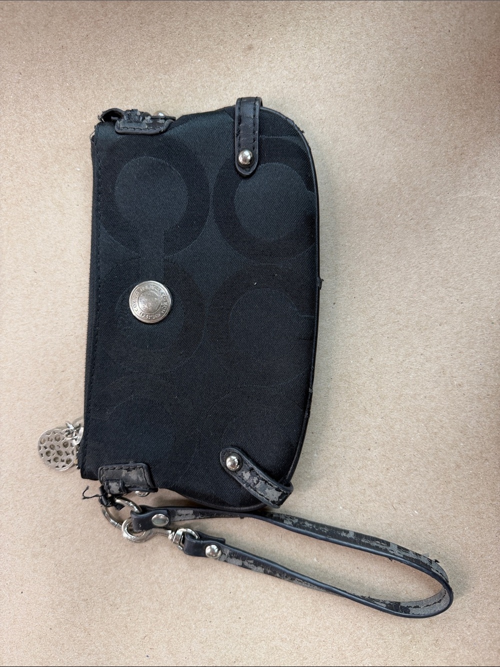 Coach Black Logo Distressed Wristlet with Silver Accent